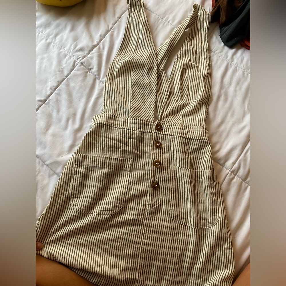 Cotton striped overall dress.